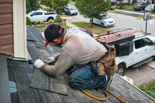 Professional Roofing technician working in Bahama, NC